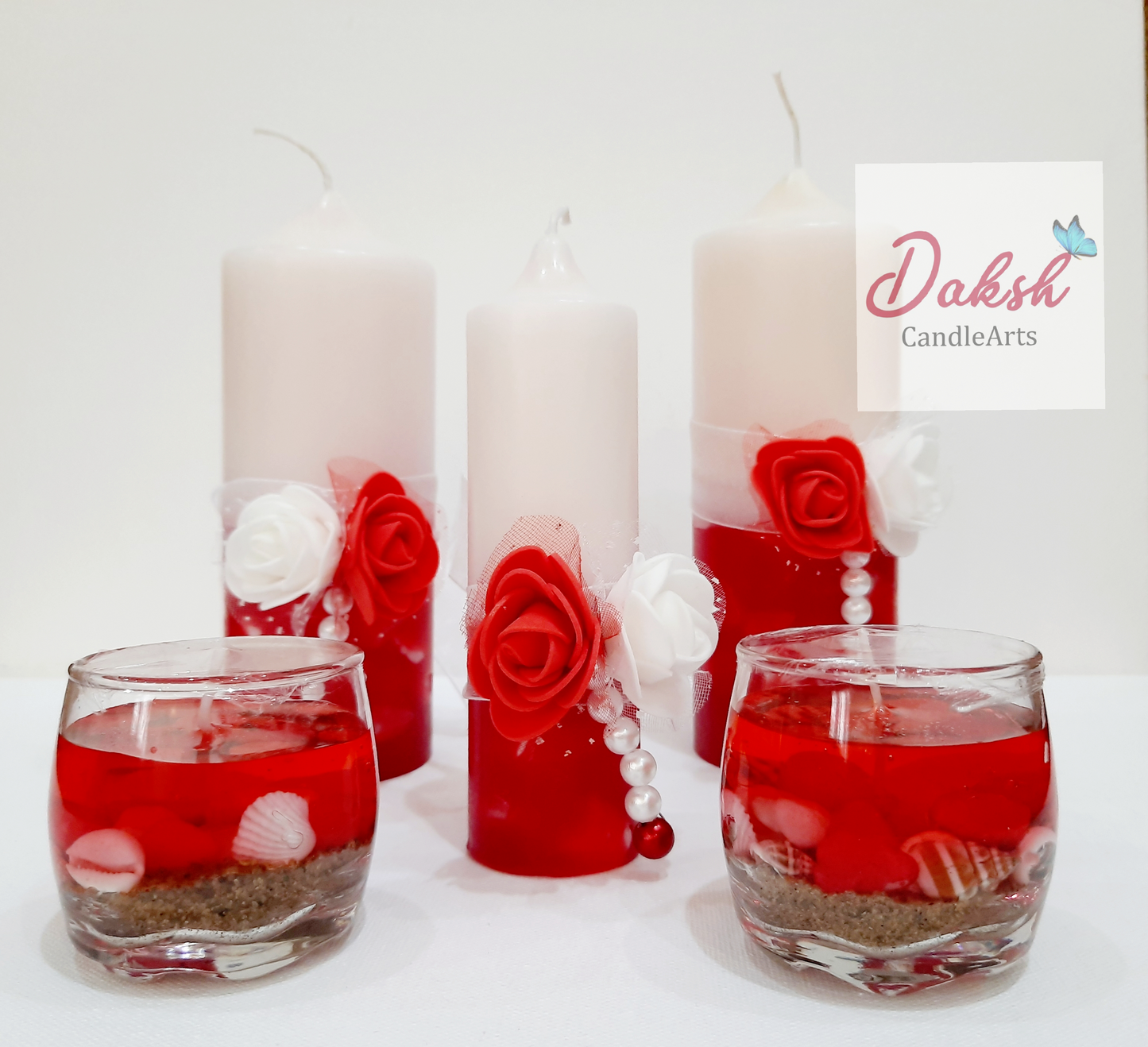 Beautifully hand designed Red & White Pillar Candles( Floral Scented , Set of 5 )